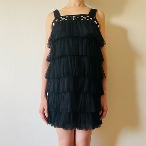 Black cocktail dress with jewels attached